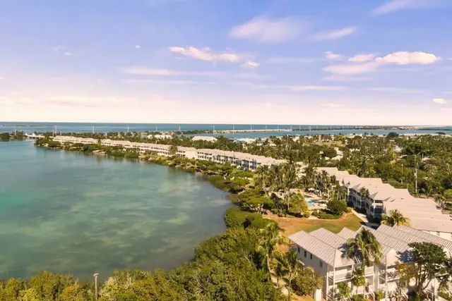 Aerial view over Duck Key: the villas, the marina and the turquoise water of the Florida Keys