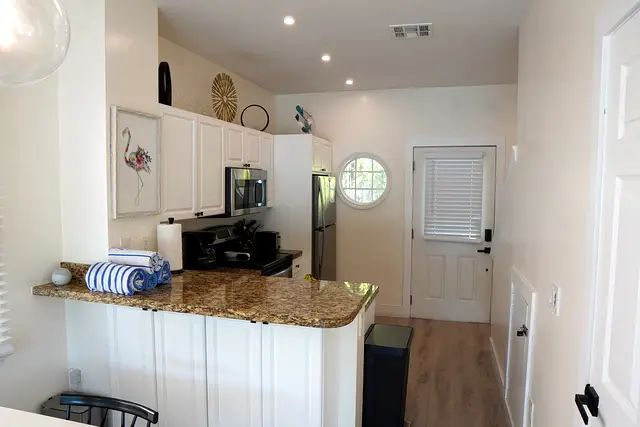 Breakfast bar at villa 5012 beside the front door, with the kitchen behind
