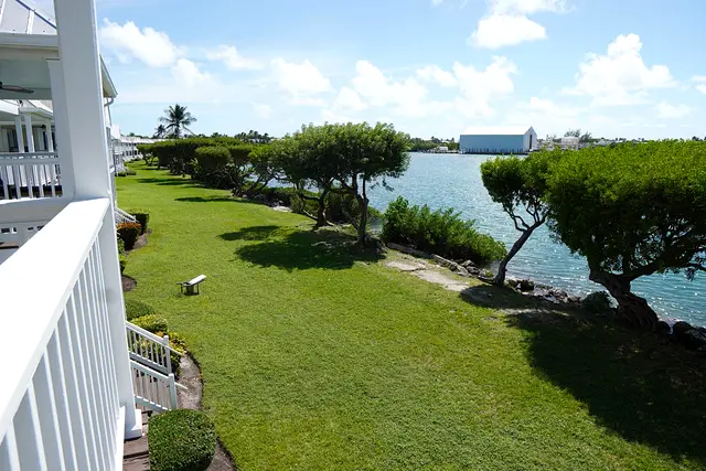 Lawn running down to the water at Hawks Cay Village, seen from the villa porch