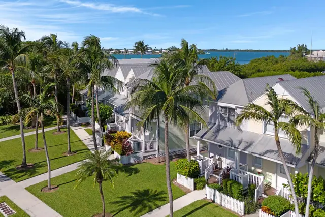 Aerial view over Hawks Cay Village: the villas, palms and the bay beyond