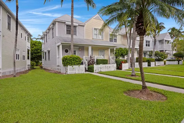 The villas at Hawks Cay Village, with palms and lawns between them